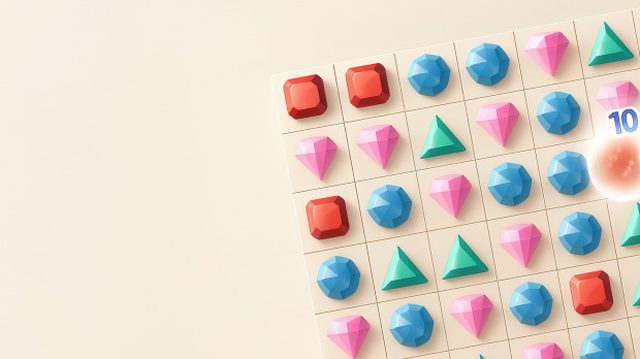 Ein Raster farbiger Edelsteine in einer Match-3-Anordnung.